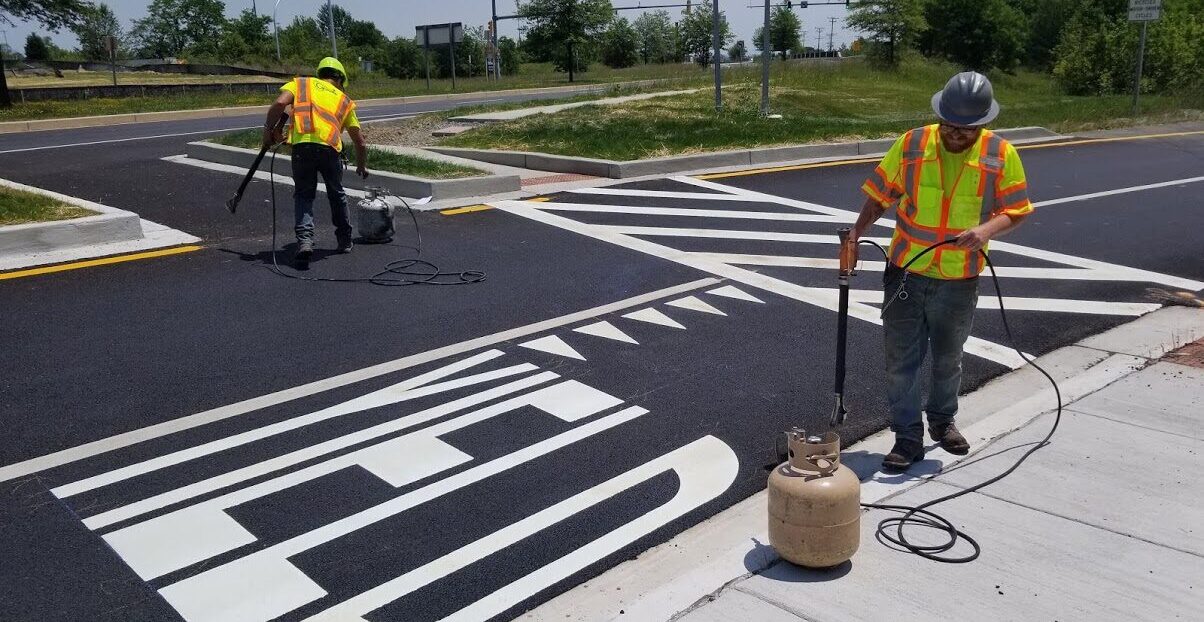 2 mans pavement marking and striping
